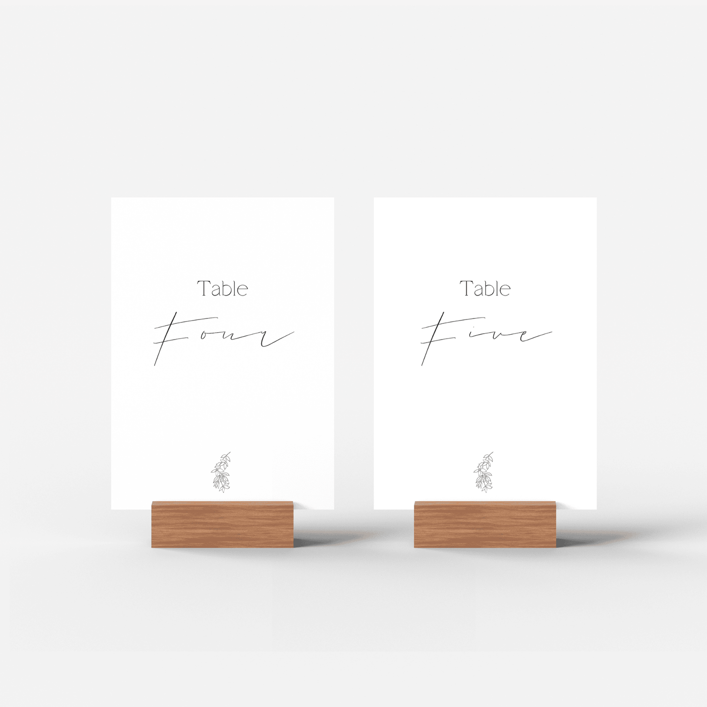 Flora wedding table numbers four and five featuring floral design to style wedding table settings and stationery