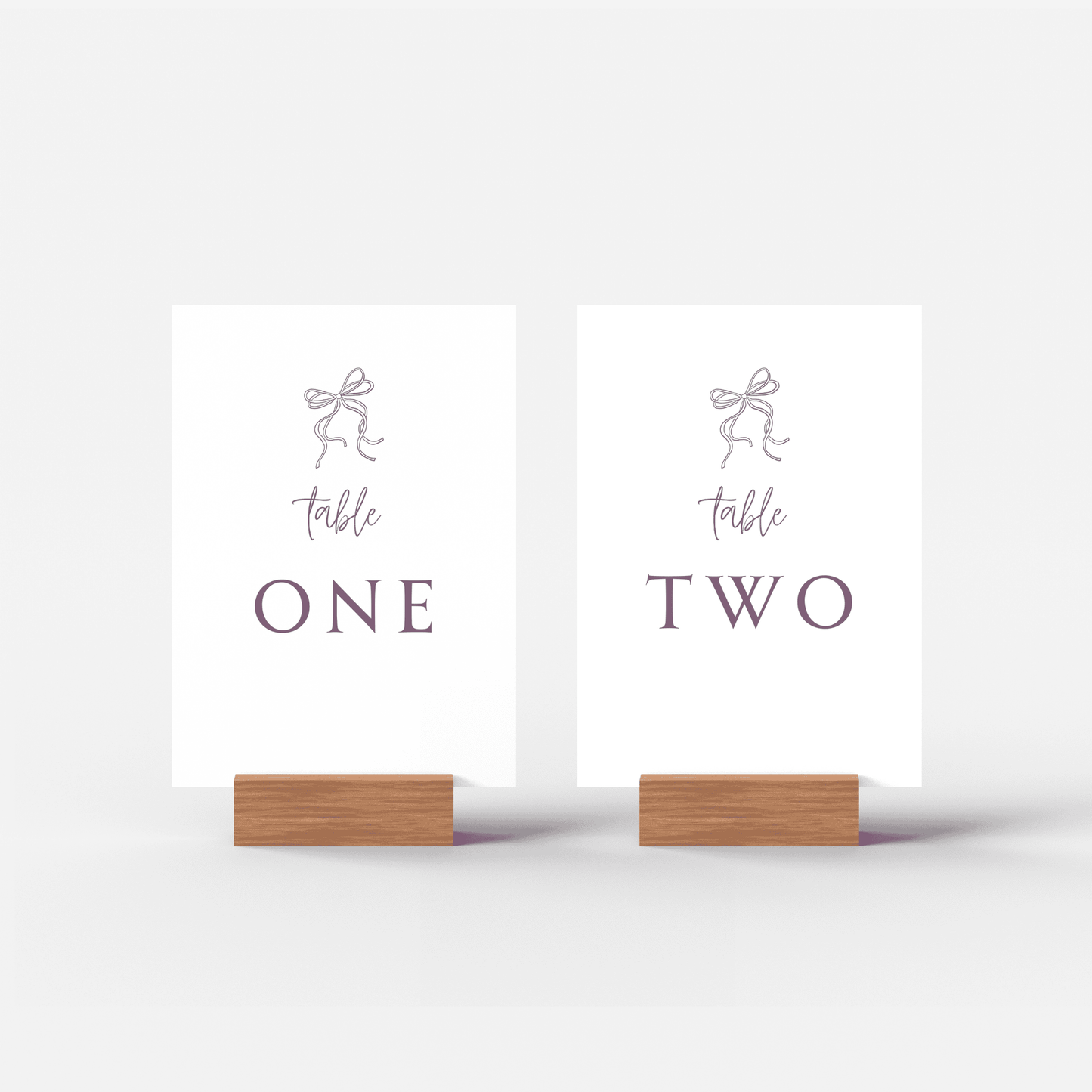 Wedding table numbers one and two with ribbon detail, ideal for reception décor and invitation suites