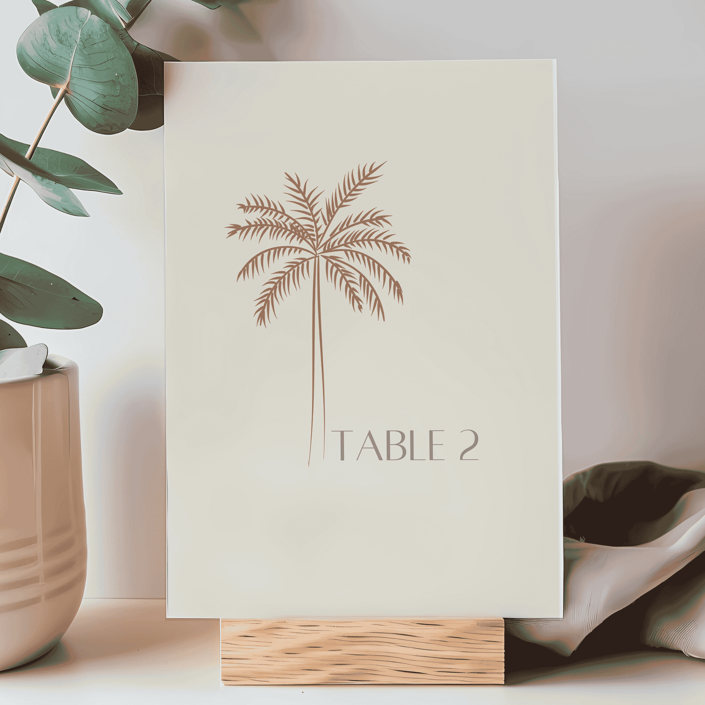 Palm table number two sign for weddings and events bringing tropical style to your reception or party décor