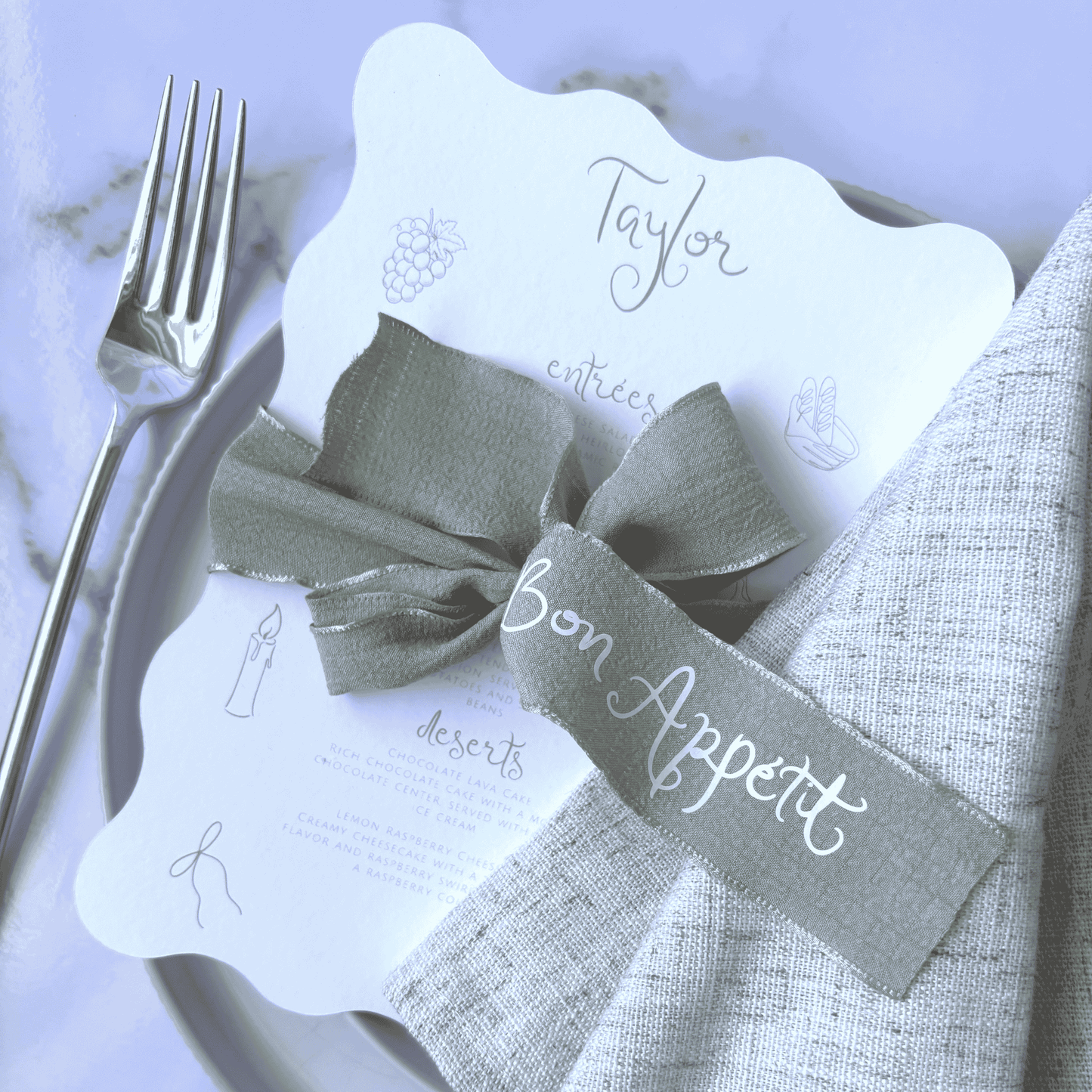 Sage green personalised ribbon styled with menu, ideal for wedding table signs or custom stationery