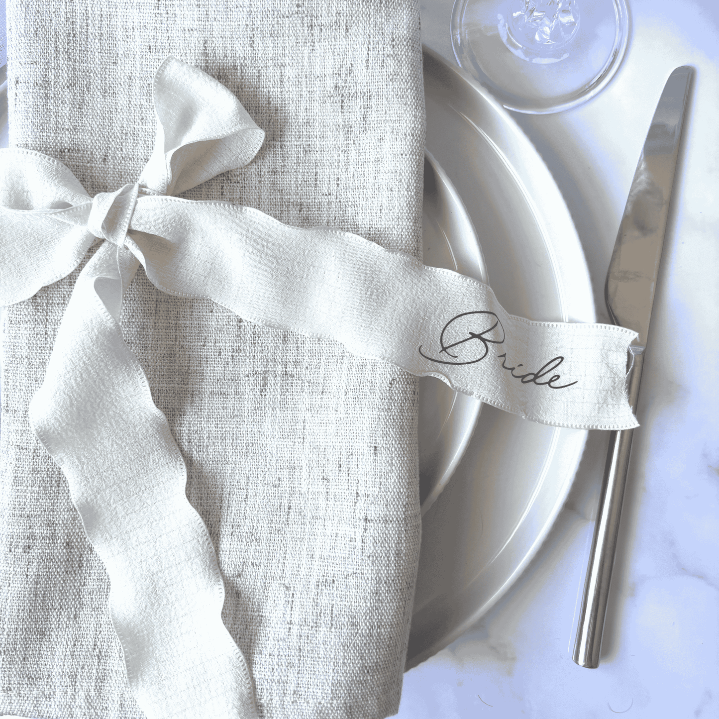 Ivory wedding ribbon with ‘Bride’ print, a unique custom touch for table settings or stationery styling