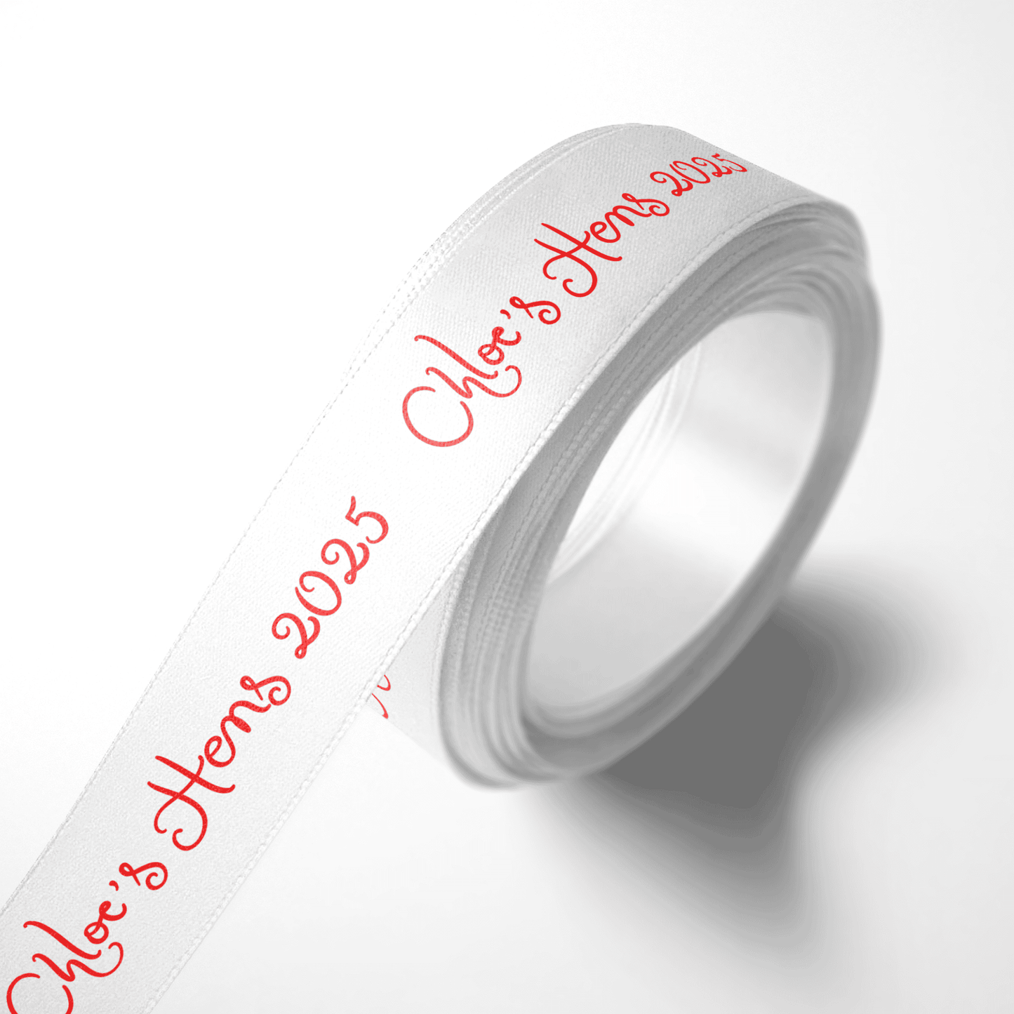 Personalised white satin ribbon with red custom print for hen parties, weddings and event decorations