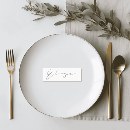 Flora wedding place card styled on a plate for wedding invitation suites wedding stationery and table settings