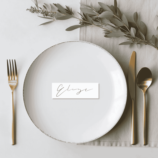 Flora wedding place card styled on a plate for wedding invitation suites wedding stationery and table settings