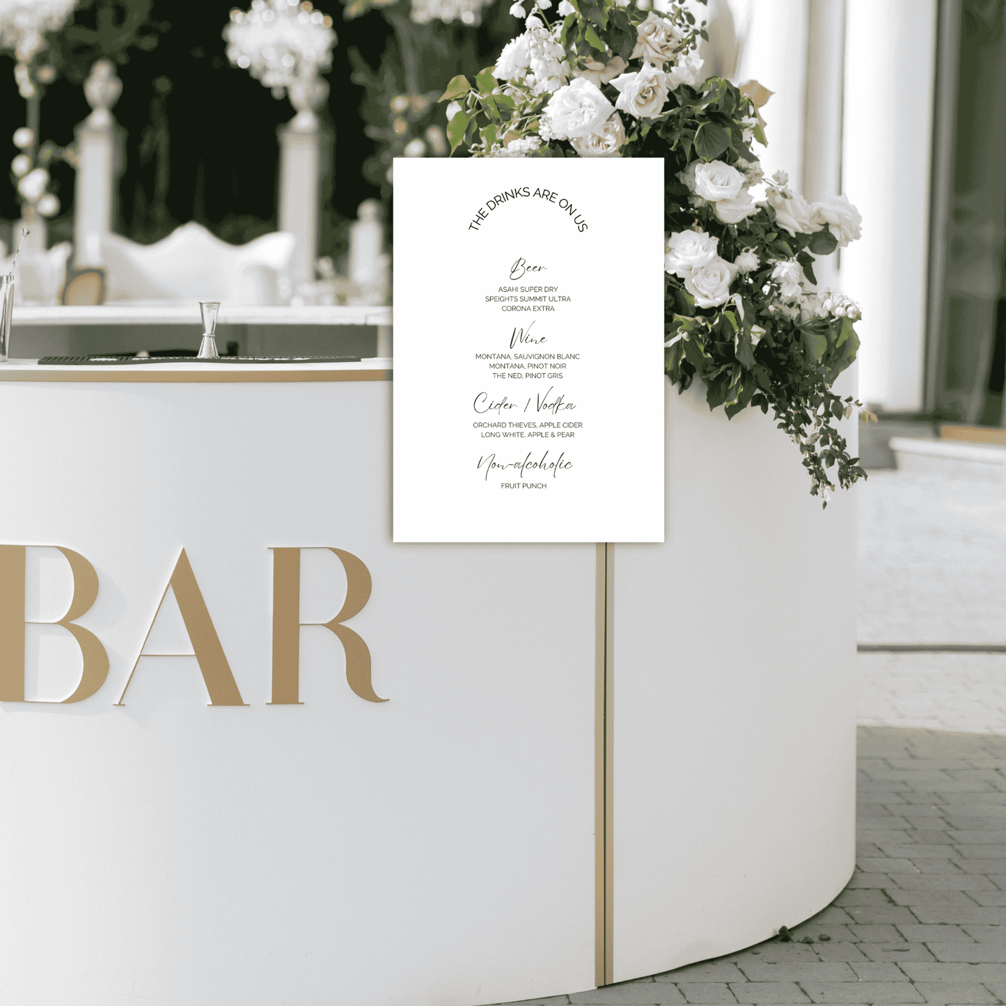 Wedding bar sign displayed on reception bar with floral styling, matching modern wedding decoration