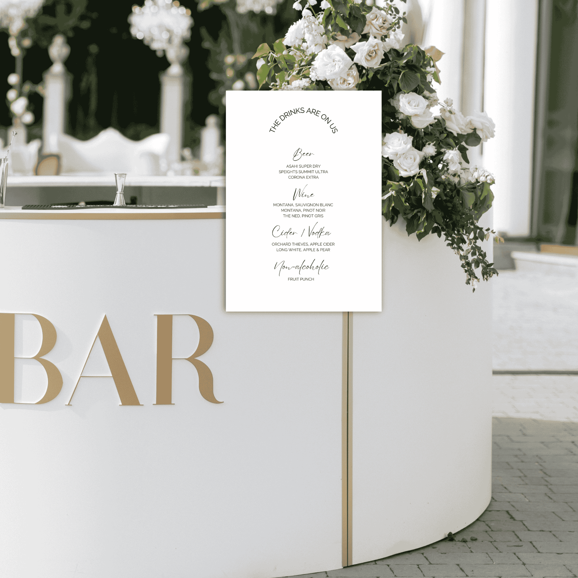 Wedding bar sign displayed on reception bar with floral styling, matching modern wedding decoration