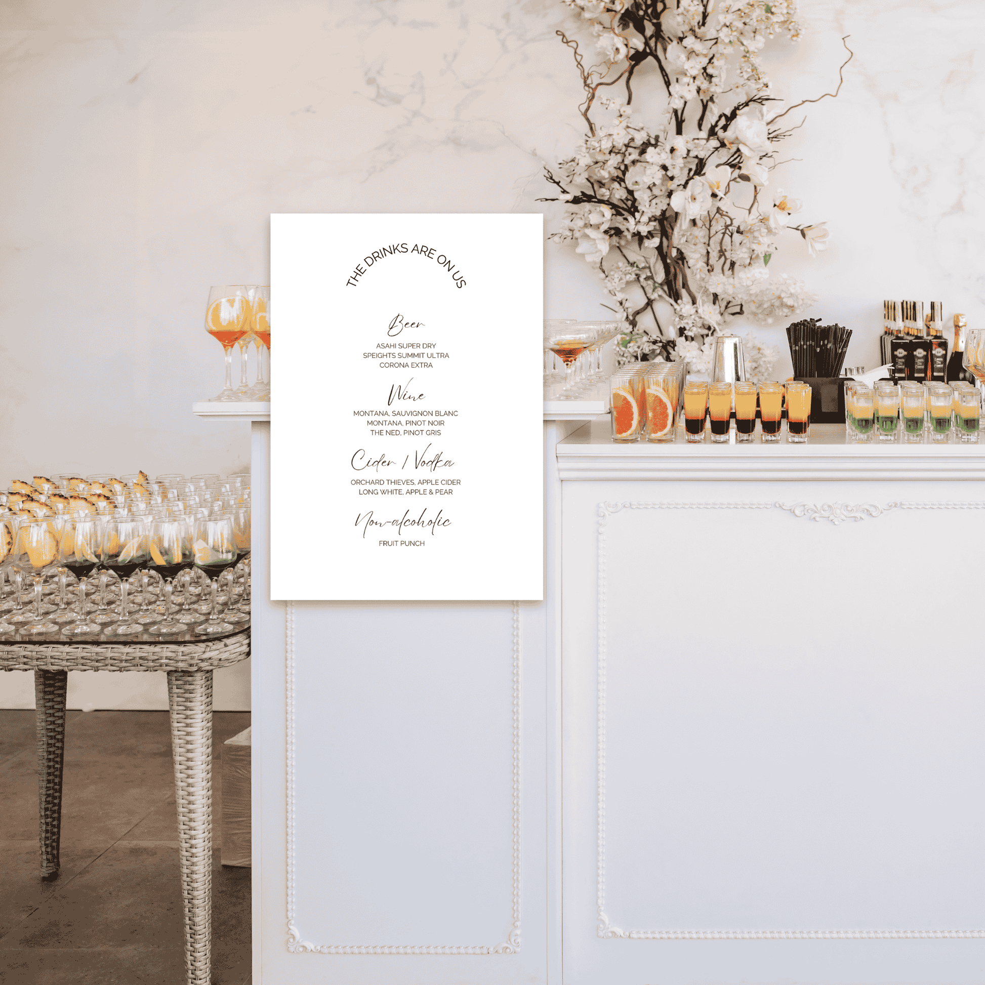 Wedding bar sign styled at drinks station as part of cohesive wedding signage and event design