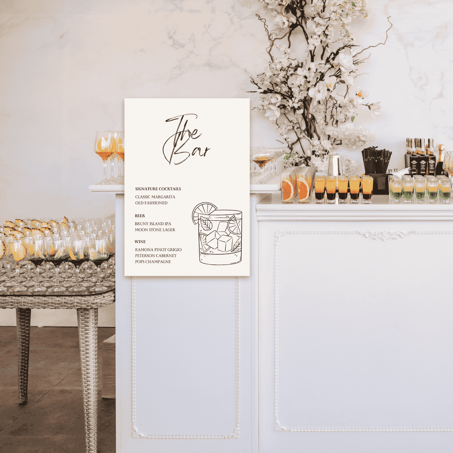 Daisy wedding bar sign with cocktail illustration displayed at reception bar, wedding signage and table signs