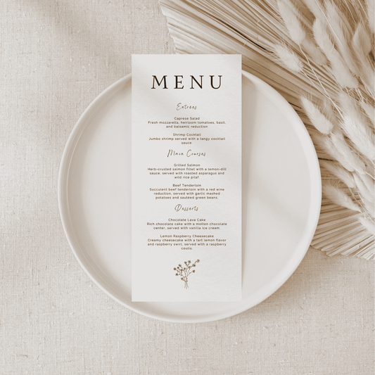 Daisy wedding menu on white plate with neutral florals for wedding table settings and wedding stationery