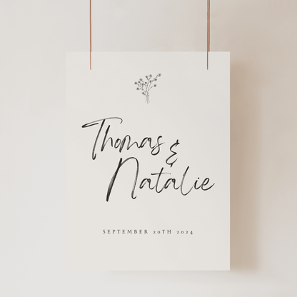 Daisy wedding welcome sign with couple names and date printed on modern wedding stationery for wedding signage