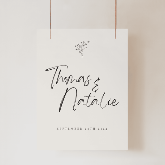 Daisy wedding welcome sign with couple names and date printed on modern wedding stationery for wedding signage