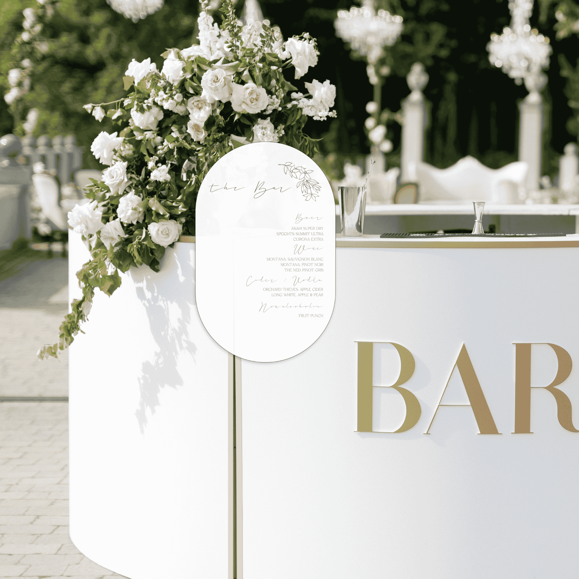 Flora wedding bar sign at outdoor reception bar, wedding signage for wedding event and table setting sign.
