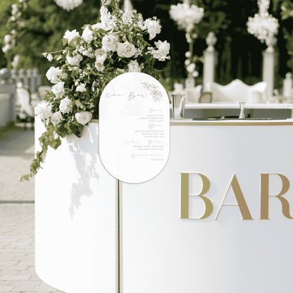 Flora wedding bar sign at outdoor reception bar, wedding signage for wedding event and table setting sign.