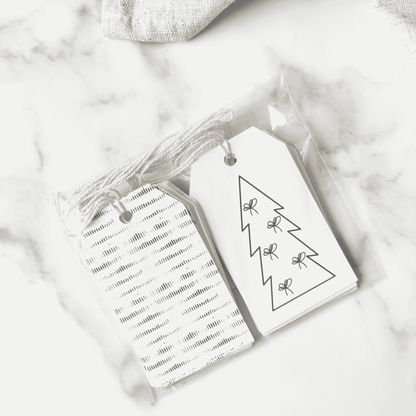 Handmade Christmas gift tags with striped patterns and simple tree illustrations, ideal for Christmas gift wrapping and festive packaging