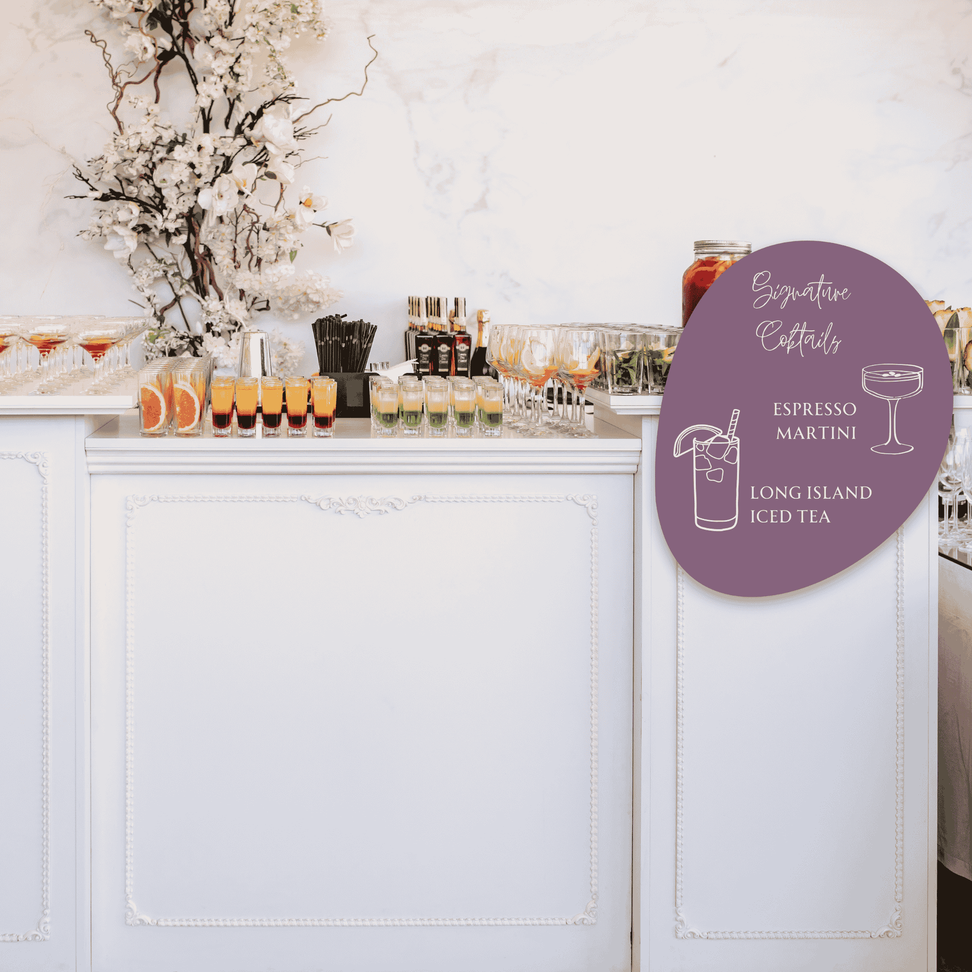 Handwritten signature cocktails menu sign at modern indoor wedding bar, custom cocktail bar signage for wedding events