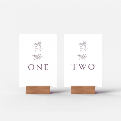 Wedding table numbers one and two with ribbon detail, ideal for reception décor and invitation suites