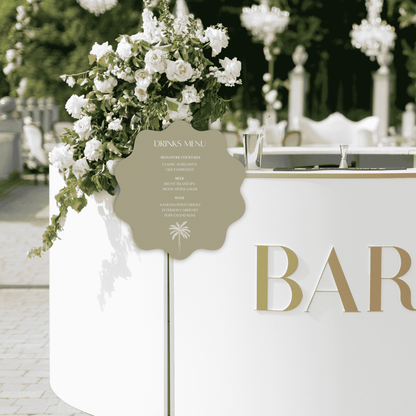 Palm bar sign styled at an outdoor wedding bar with florals, ideal wedding signage for a styled wedding event