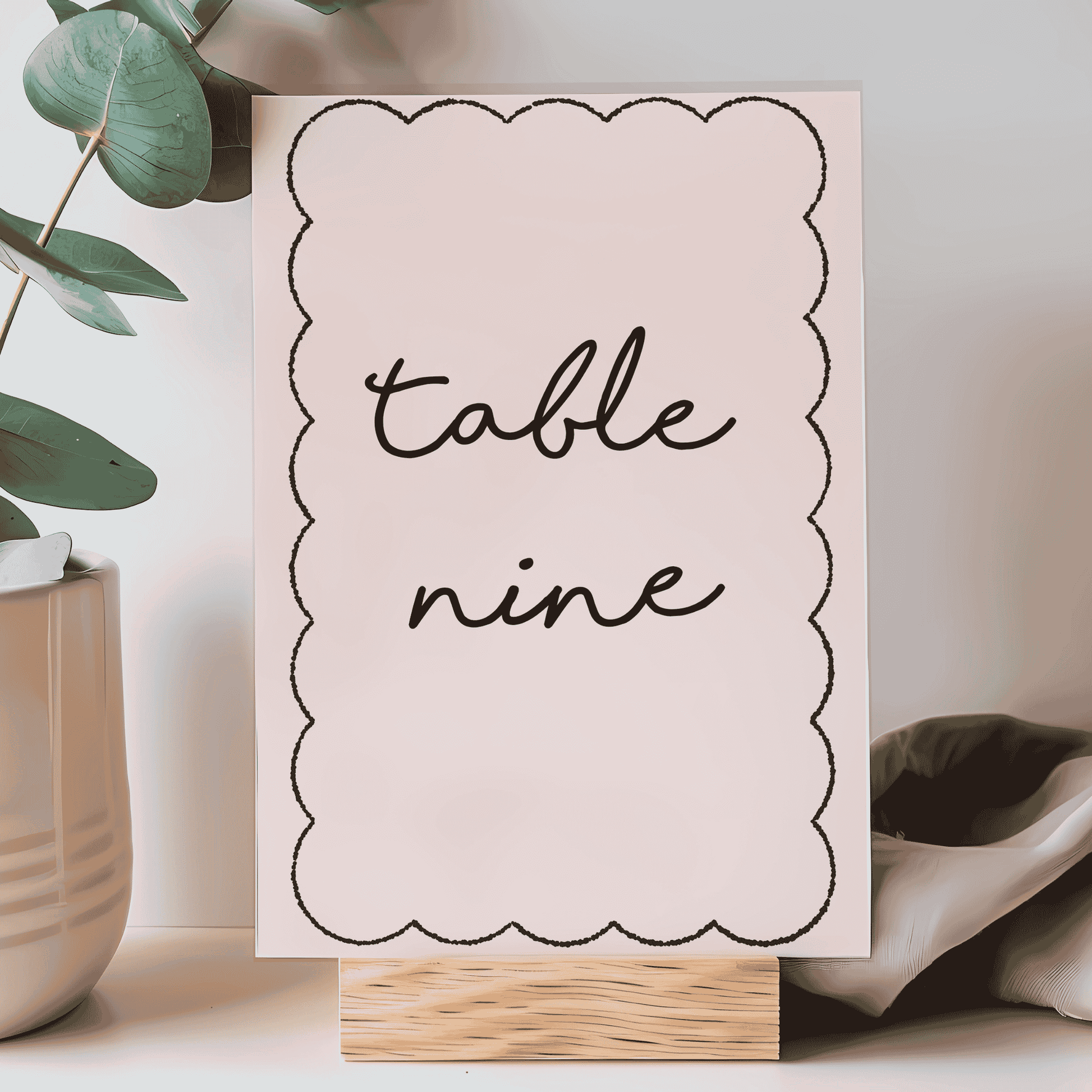 Paris style table number card with scalloped edge, the perfect wedding decor detail for guest tables