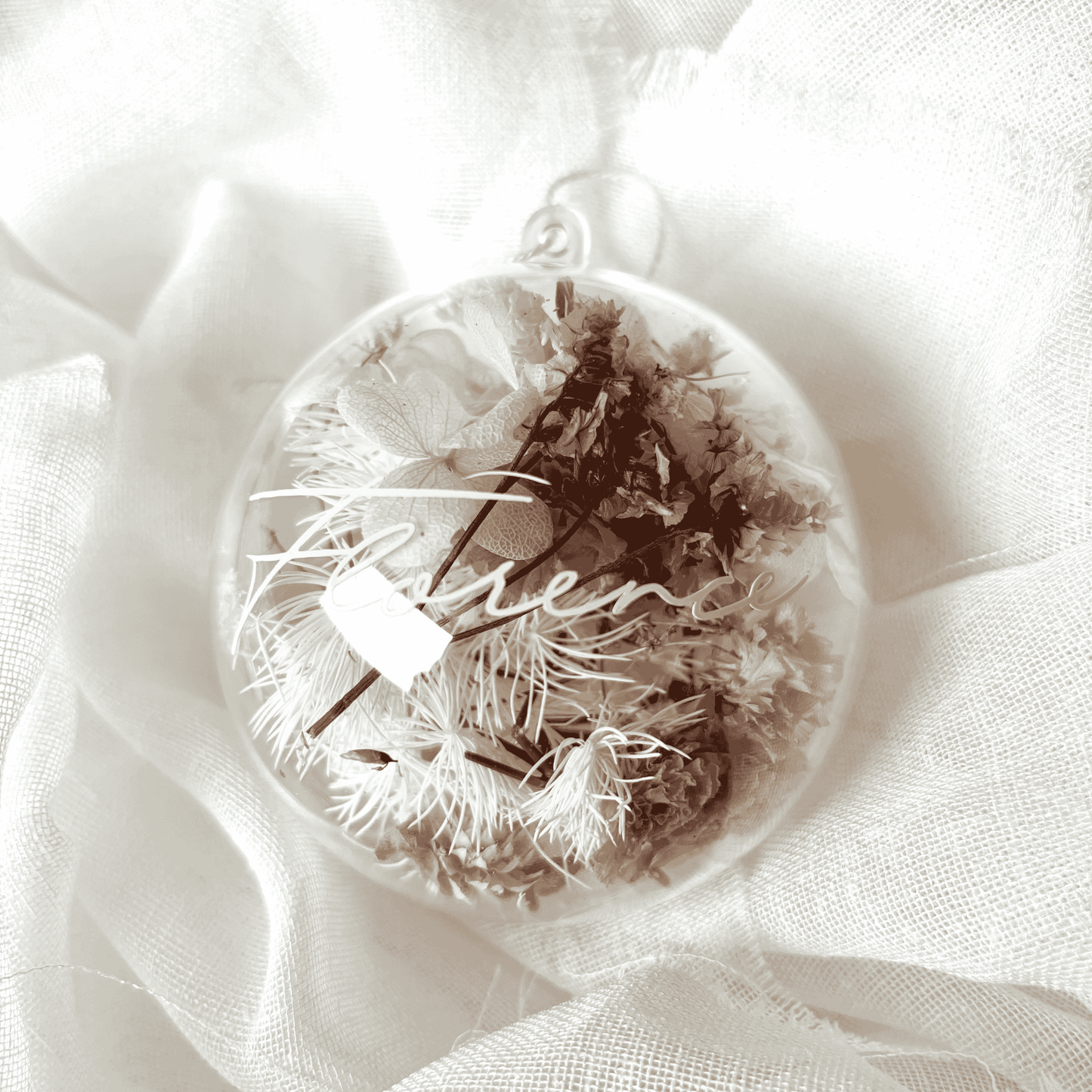 Personalised dried floral Christmas bauble with cream and maroon tones, perfect for Christmas tree styling and keepsake gifting