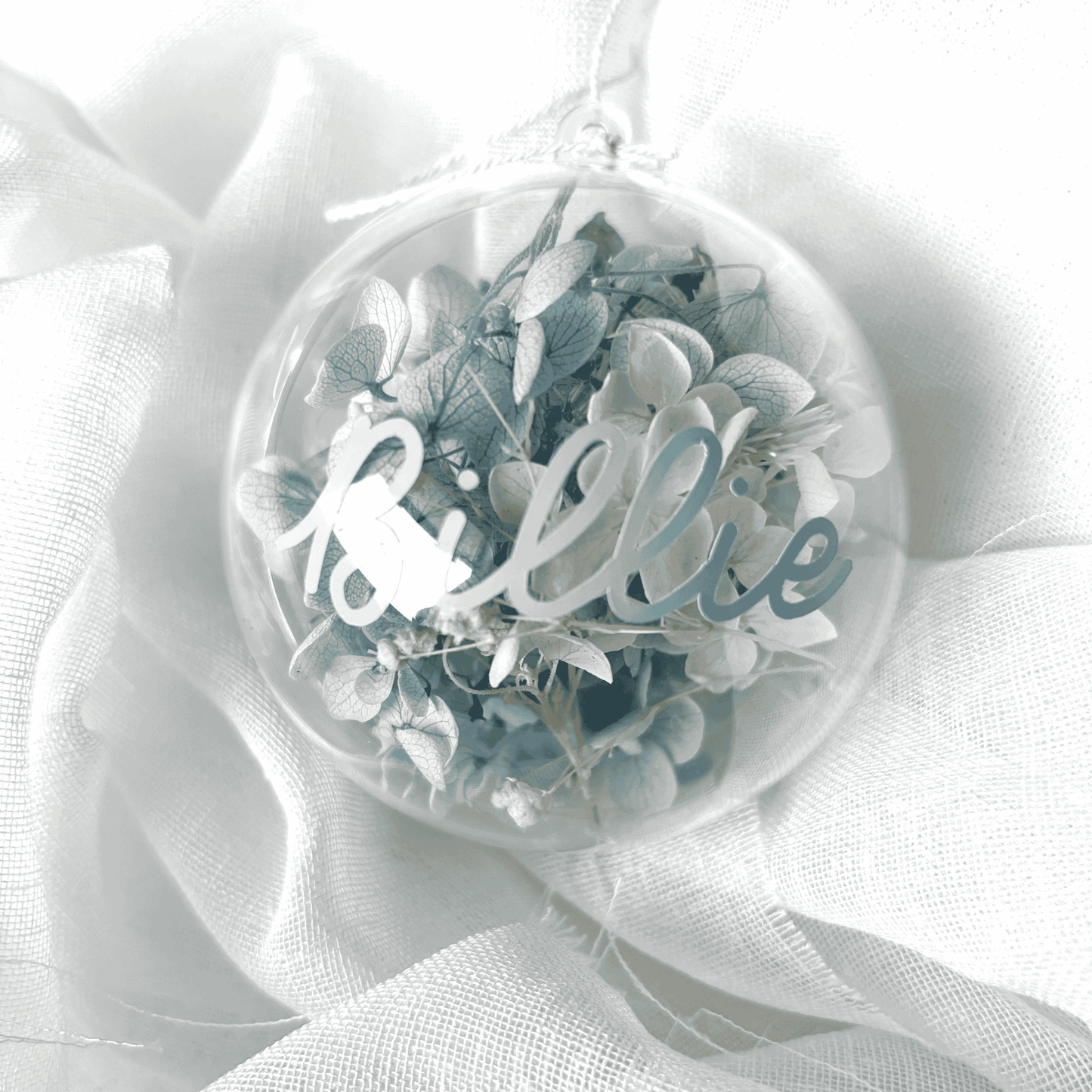 Personalised dried floral Christmas bauble with white and blue flowers, ideal for Christmas tree decoration and festive gifting