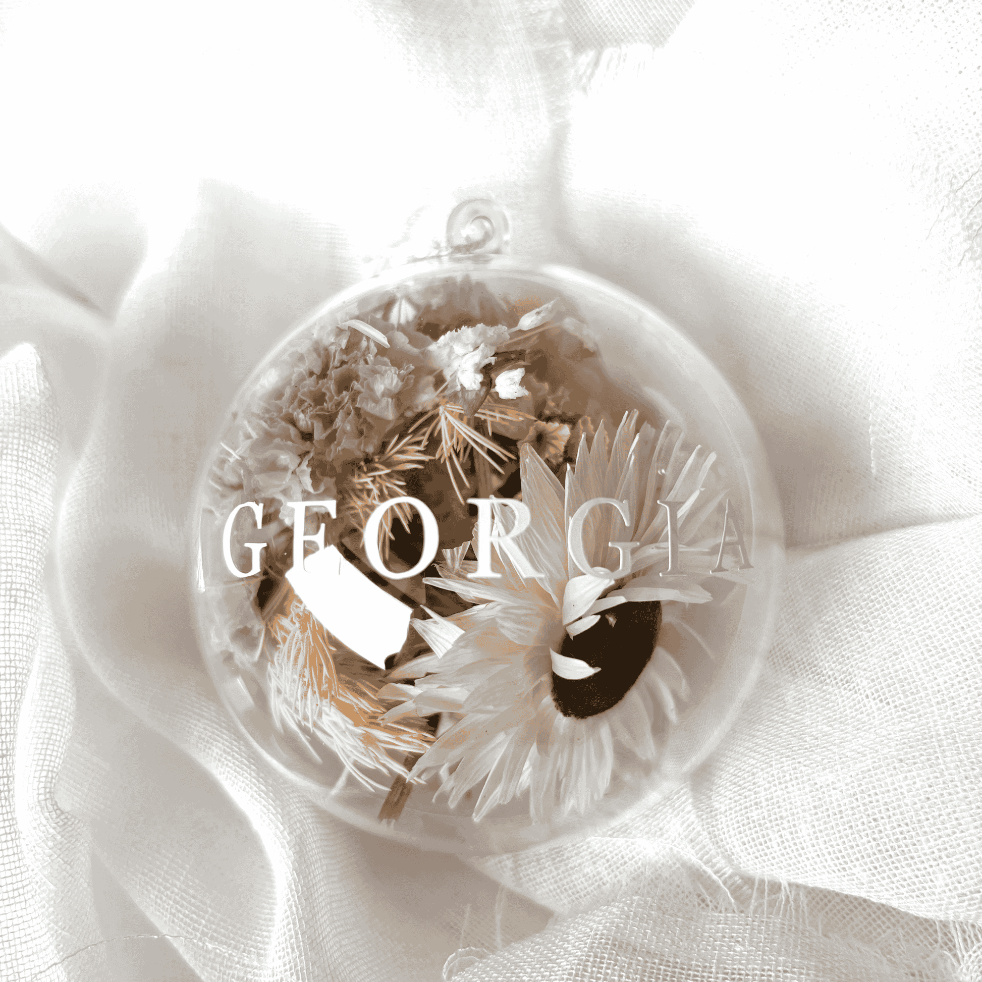 Personalised dried floral Christmas bauble with white and soft purple florals, ideal for Christmas tree display and keepsakes
