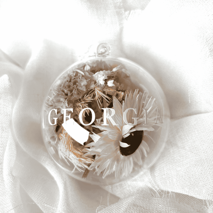 Personalised dried floral Christmas bauble with white and soft purple florals, ideal for Christmas tree display and keepsakes
