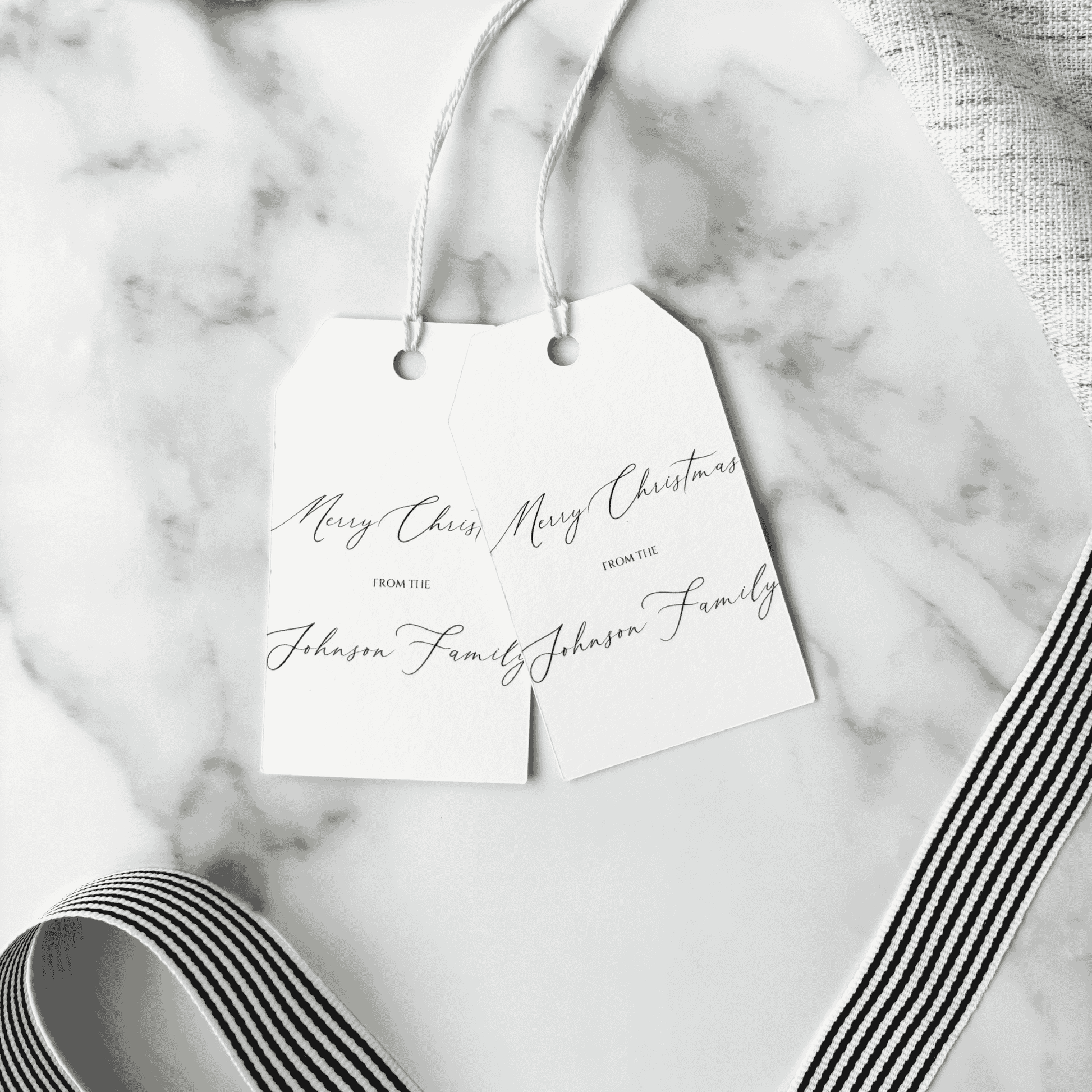 Set of personalised Christmas gift tags with handwritten names, printed stationery accessories for gift wrapping