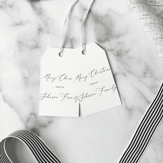 Set of personalised Christmas gift tags with handwritten names, printed stationery accessories for gift wrapping