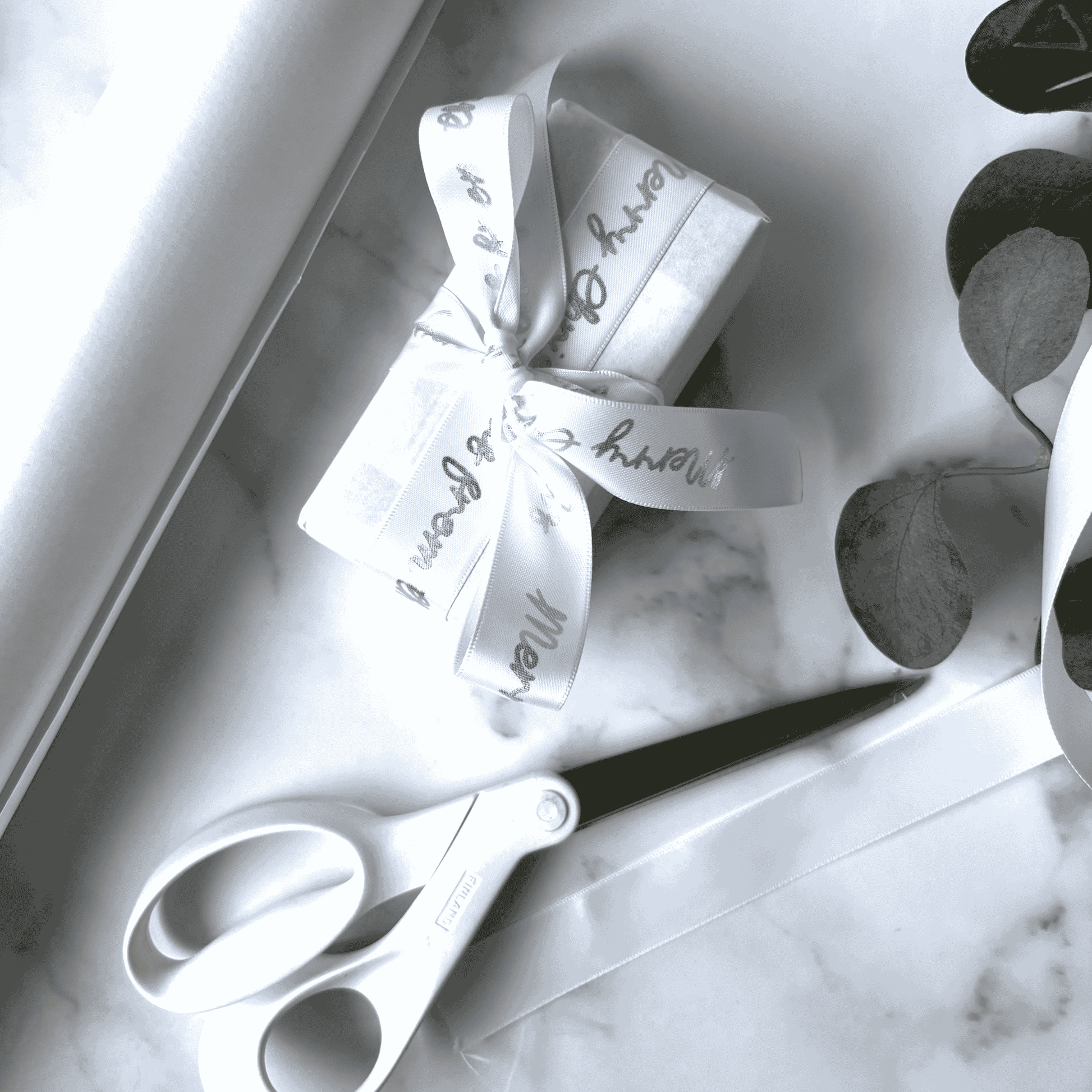 White personalised ribbon with metallic silver print for wedding invitations and stationery