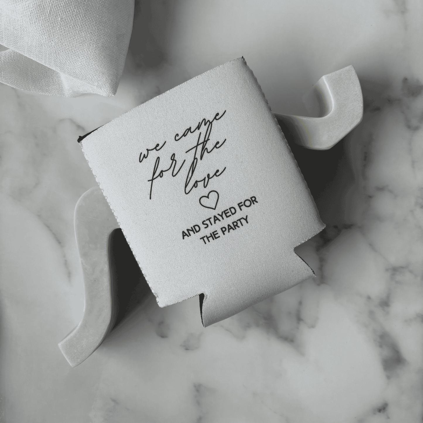 Printed wedding stubby holders styled for a wedding event, personalised wedding favours matching custom wedding invitations